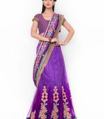 Purple embroidered net saree with blouse