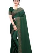 Green embroidered satin saree with blouse