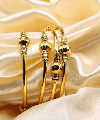 Set Of Four Bangles In Gold Color 1
