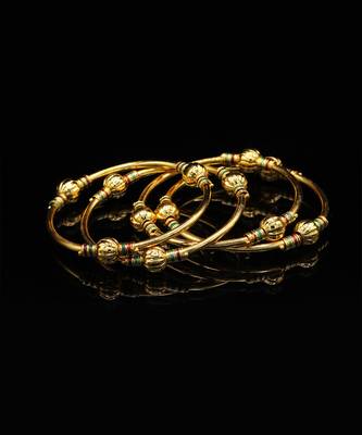 Set Of Four Bangles In Gold Color 4