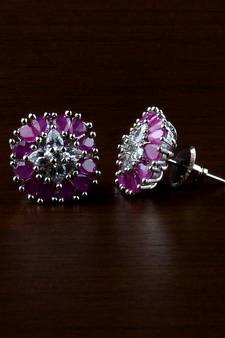 Rhodium Plated Ruby Stone Embellished American Diamond Earrings 216ED505