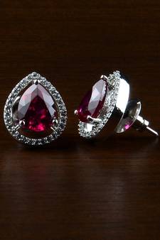 Rhodium Plated Hydro Ruby Stone Embellished American Diamond Earrings 216ED519