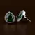 Rhodium Plated Green Stone Embellished American Diamond Earrings 216ED520