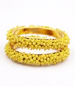 Yellow bangles-and-bracelets