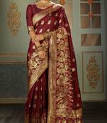 Maroon woven banarasi silk saree with blouse