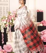 Cloud White Ikkat Saree With Black And Red Checkered Pallu