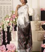 Ivory Ikkat Saree With Black And Red Pallu