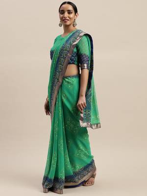 Green printed georgette saree with blouse 1