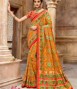 Mustard embroidered silk saree with blouse