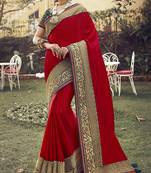 Red embroidered tussar silk saree with blouse