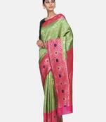 green woven banarasi saree with blouse