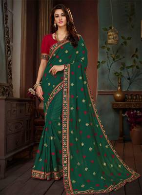 Dark green embroidered silk blend saree with blouse 1