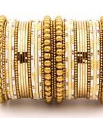 Beige bangles-and-bracelets