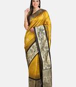 Yellow woven banarasi saree with blouse
