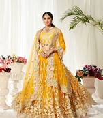 Yellow embroidered net semi stitched lehenga