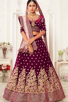 Engaging Purple Zari, Sequins and thread embroidered velvet fabric lehenga choli for dulhan