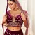 Engaging Purple Zari, Sequins and thread embroidered velvet fabric lehenga choli for dulhan