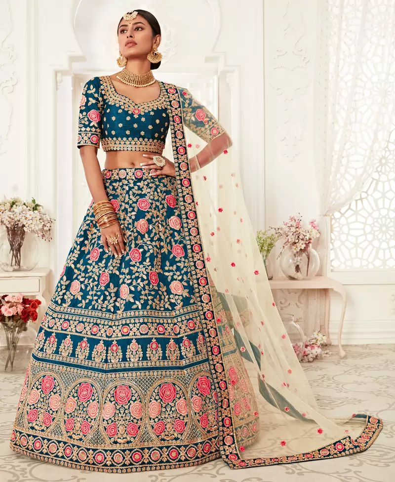 Glamorous Rama Blue Zari, Sequins and Thread Embroidered Slub Silk fabric Lehenga choli for bride