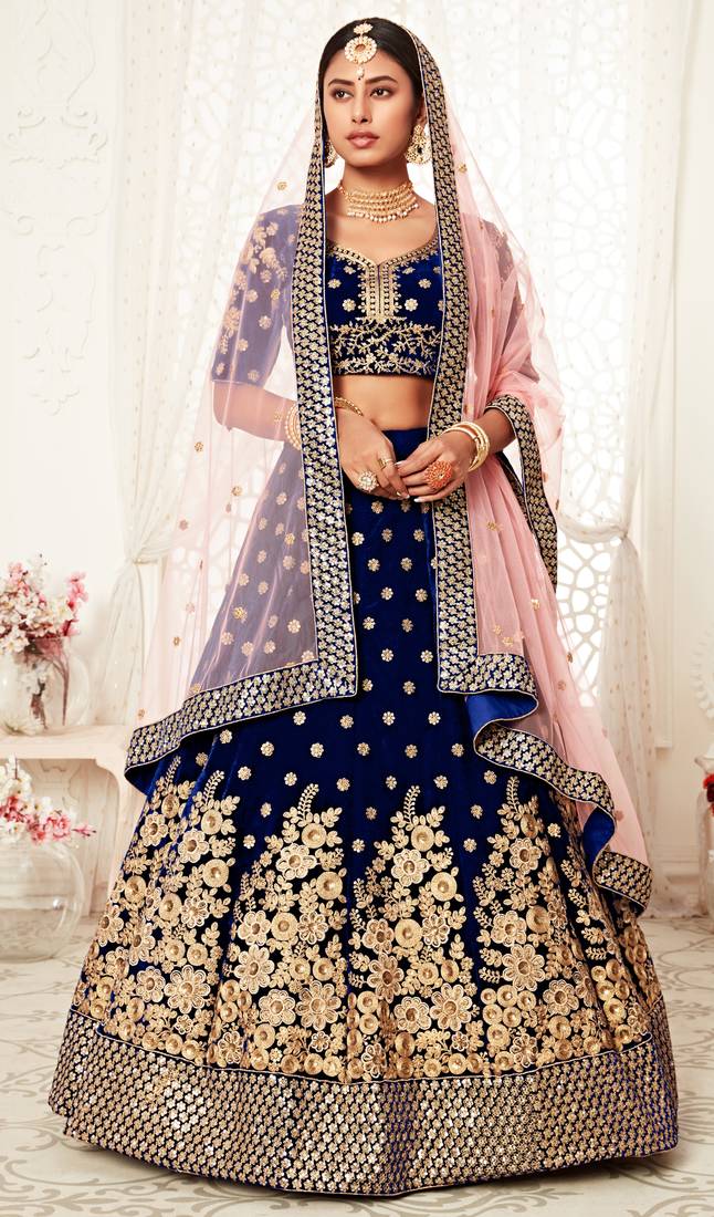 Alluring Navy-blue Zari, Sequins and thread embroidered Velvet Fabric Lehenga choli for bridal