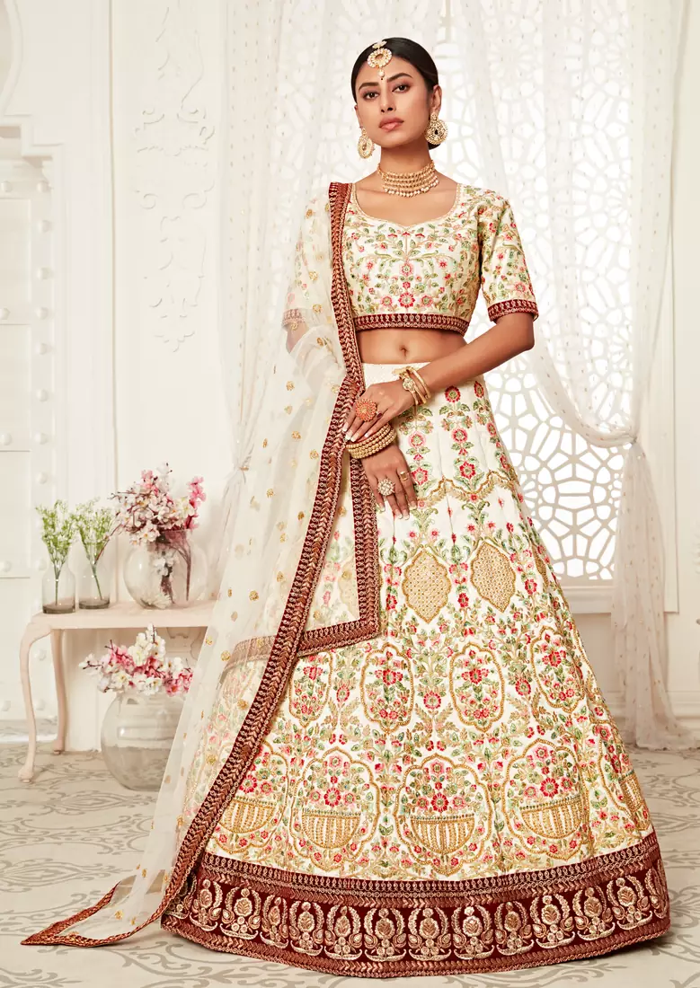 Marvelous Off-white Zari, Sequins and Thread Embroidered art Silk fabric designer lehenga choli for wedding