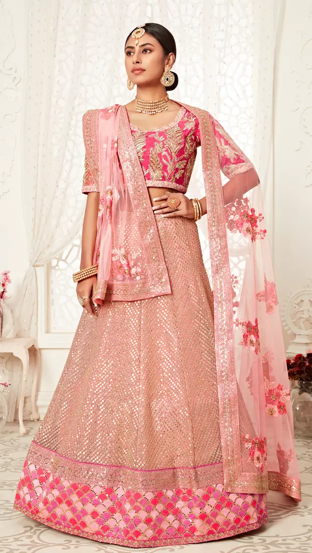 Hypnotizing Pink Zari, Sequins and Thread Embroidered Designer Net fabric lehenga choli