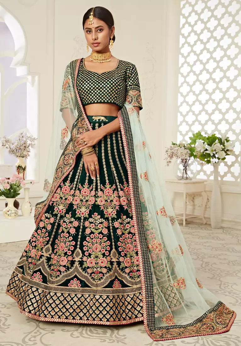 Delightful Dark Green Zari, Sequins and Thread Embroidered velvet fabric lehenga choli for wedding