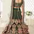 Delightful Dark Green Zari, Sequins and Thread Embroidered velvet fabric lehenga choli for wedding