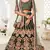 Delightful Dark Green Zari, Sequins and Thread Embroidered velvet fabric lehenga choli for wedding