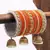 Orange bangles-and-bracelets