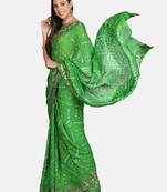 Green printed georgette saree with blouse