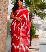 Red and white leheriya tie dye slub cotton saree with zari border along with blouse