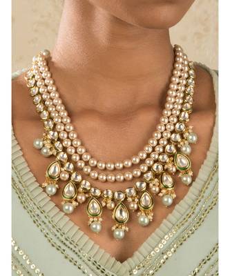 Intricate Spectacle Cream And Green Kundan  Pearls Necklace Set. 1