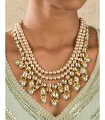 Intricate Spectacle Cream And Green Kundan  Pearls Necklace Set.