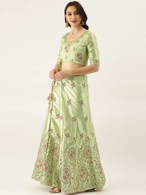 Green embroidered silk semi stitched lehenga 4