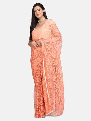 Peach plain net saree with blouse 1