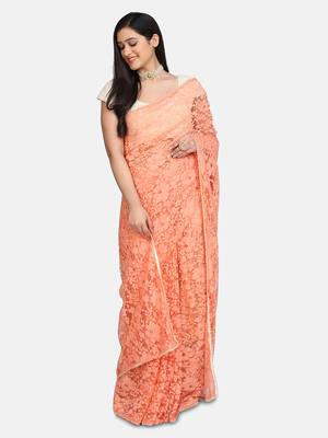 Peach plain net saree with blouse 4