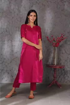 Pink art silk kurta set paired with scalloup duppatta