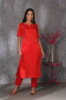 Red art silk kurta set paired with scalloup duppatta