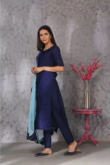 Blue art silk kurta set paired with scalloup duppatta