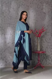 Blue art silk kurta set paired with scalloup duppatta