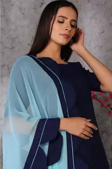 Blue art silk kurta set paired with scalloup duppatta