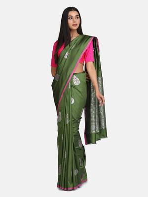 Green woven silk blend saree with blouse 6