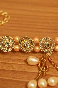 Gold waist-belt