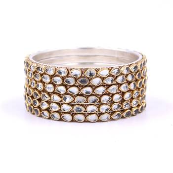White bangles-and-bracelets 1