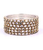 White bangles-and-bracelets