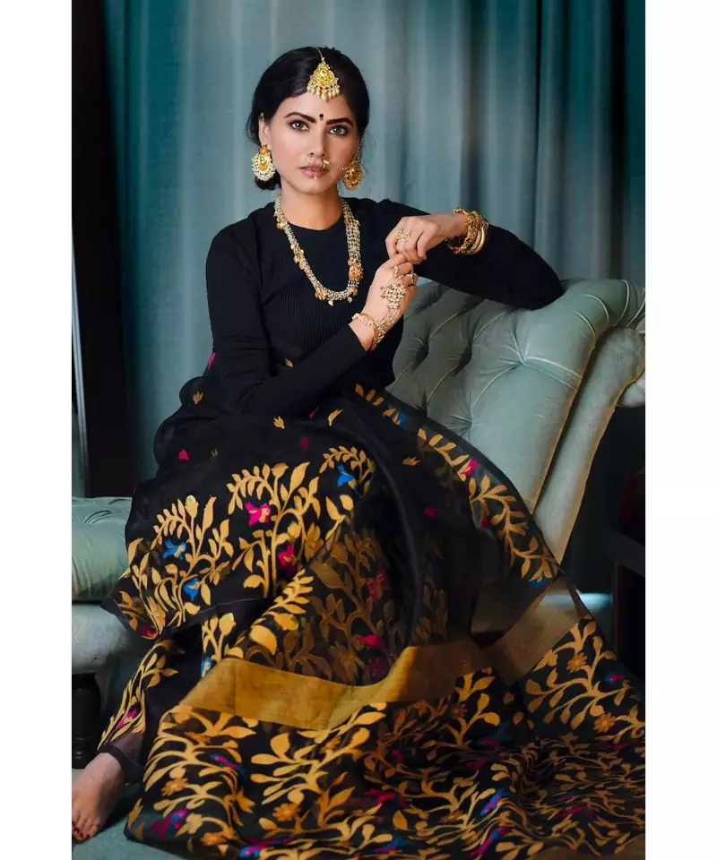 Stunning resham silk jamdani saree in black with all over multi colour floral work