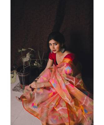 Stunning resham silk jamdani saree in peach with all over multi colour floral work 4