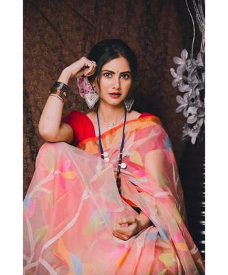 Stunning resham silk jamdani saree in peach with all over multi colour floral work 1