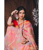 Stunning resham silk jamdani saree in peach with all over multi colour floral work
