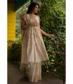Stunning matka silk jamdani saree in beige with all over floral motifs